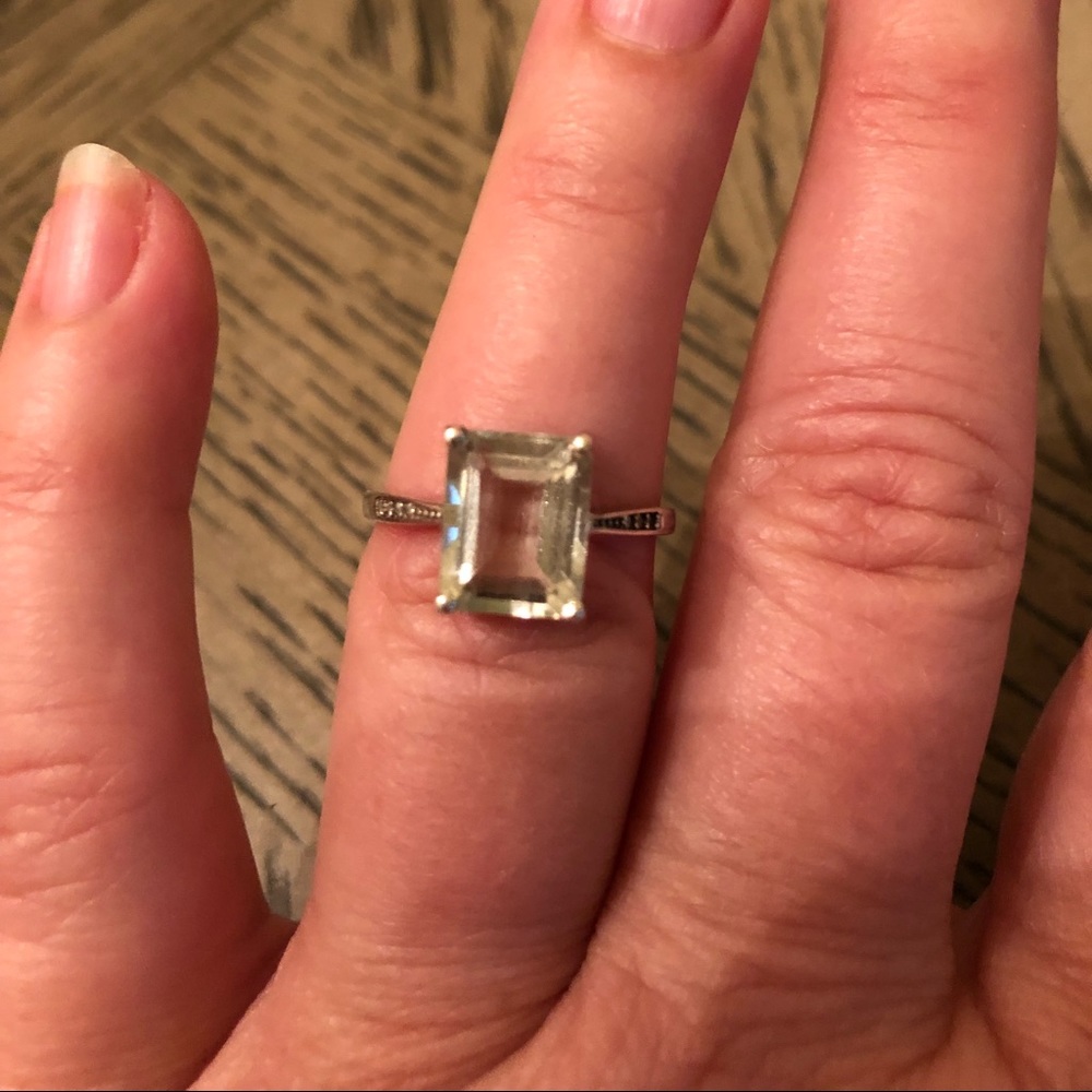 Light green peridot and diamond ring